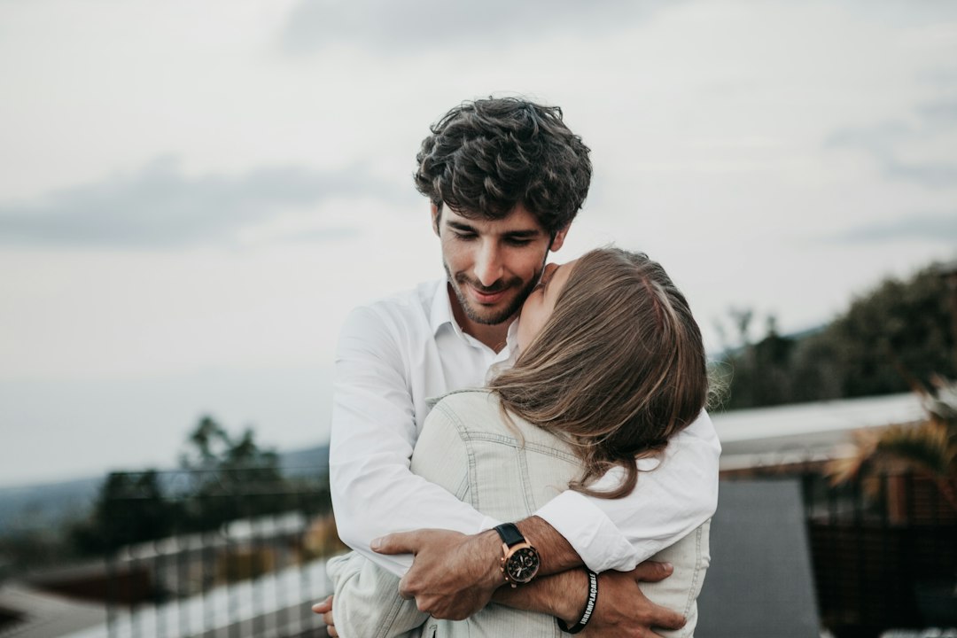 Husband and wife embracing warmly at home — Christian Gifts for Wife from Nordenzi