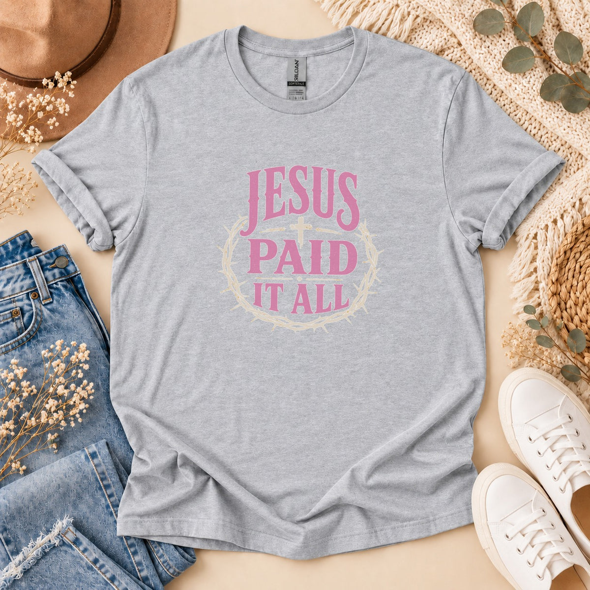 Grey t-shirt with pink text "JESUS PAID IT ALL" and a crown of thorns graphic.