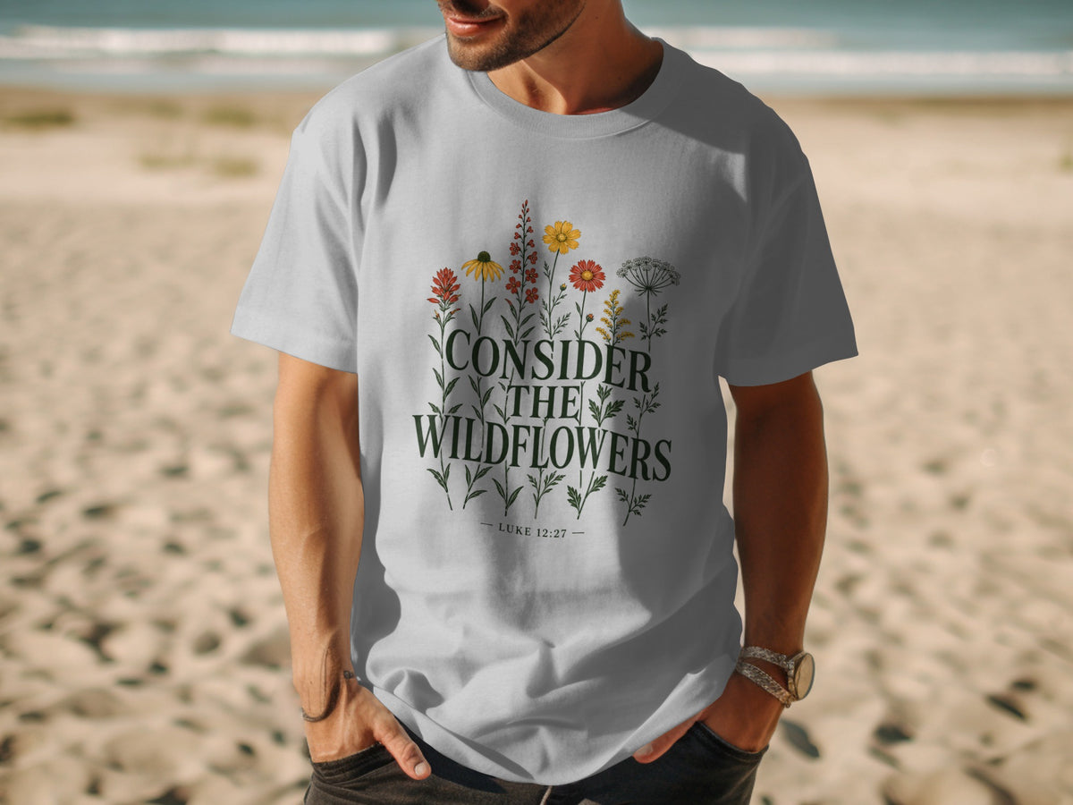 Gray t-shirt with "CONSIDER THE WILDFLOWERS LUKE 12:27" and floral illustration.