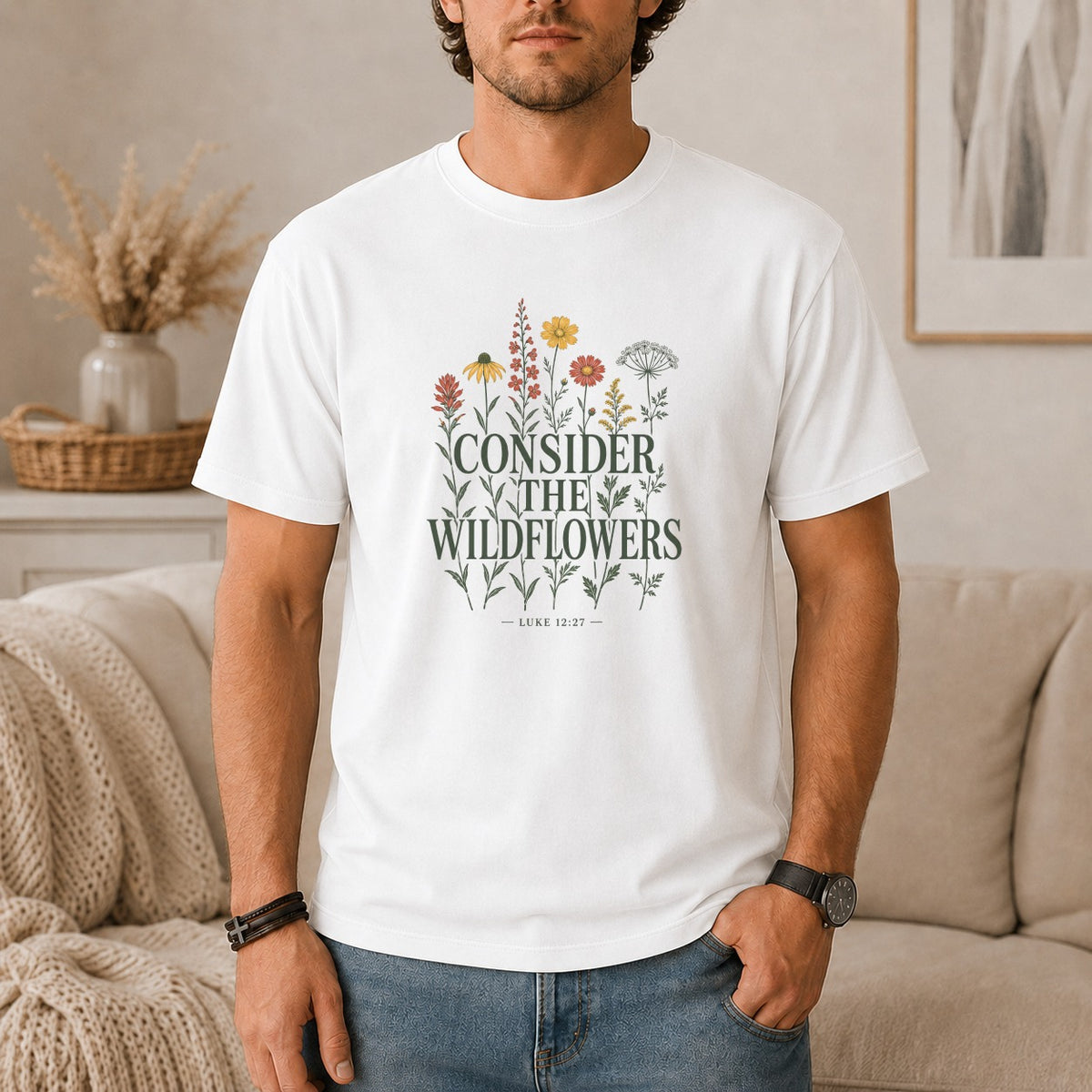 White t-shirt with "Consider the Wildflowers" and "Luke 12:27" text and floral design.