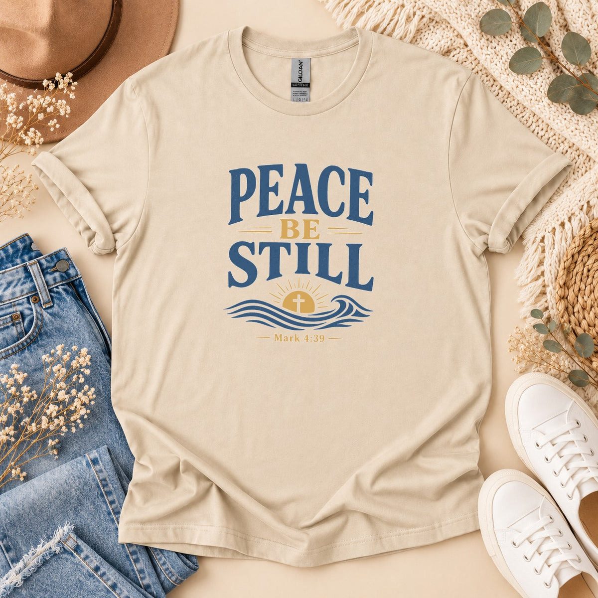 Be Still with sunrise, waves, cross graphic, and "Mark 4:39" text.