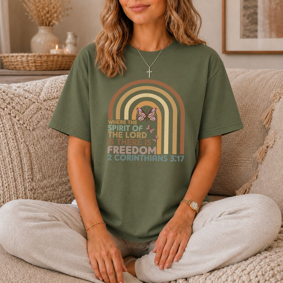 Green t-shirt with rainbow graphic and text: "Where the Spirit of the Lord is there is freedom 2 Corinthians 3:17".