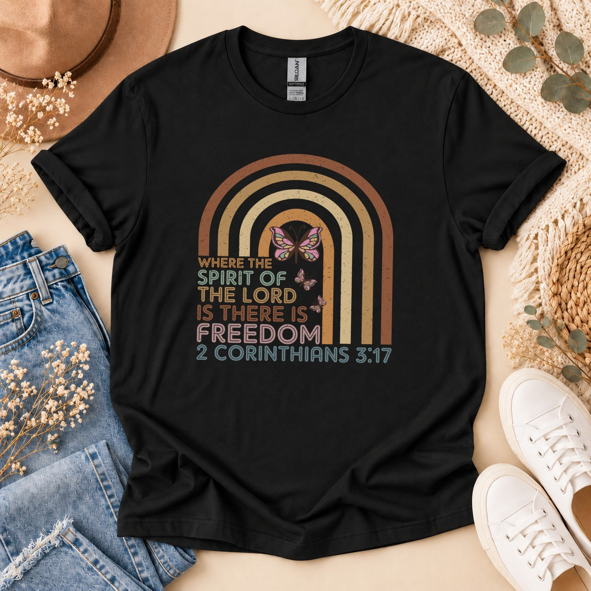 Black t-shirt with rainbow graphic and text "Where the Spirit of the Lord is there is Freedom 2 Corinthians 3:17".