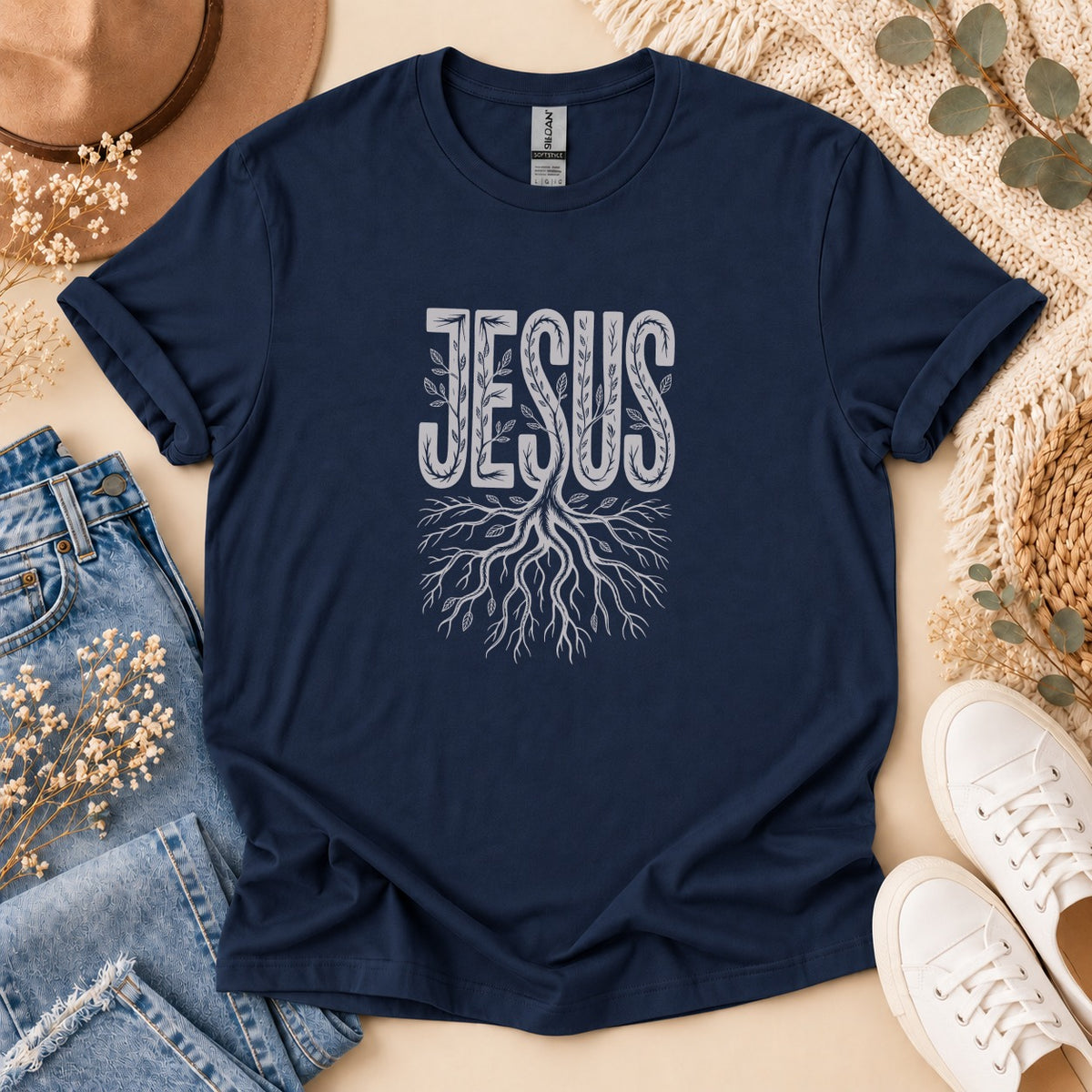 Navy t-shirt with "JESUS" text and root graphic.