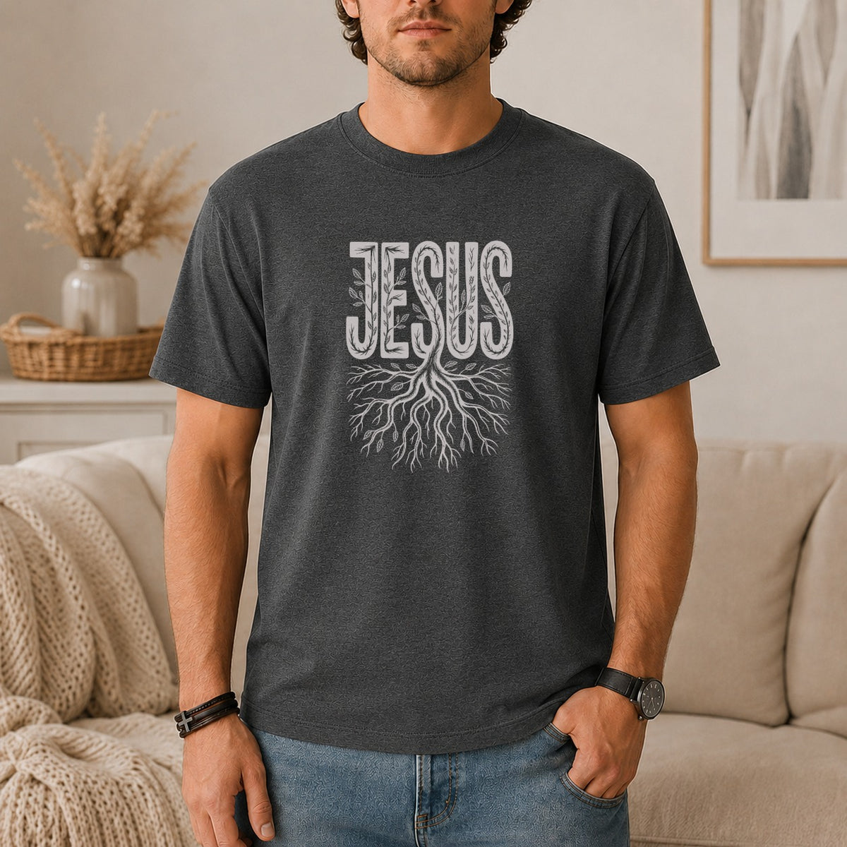 Dark grey t-shirt with white "JESUS" text and tree roots graphic.