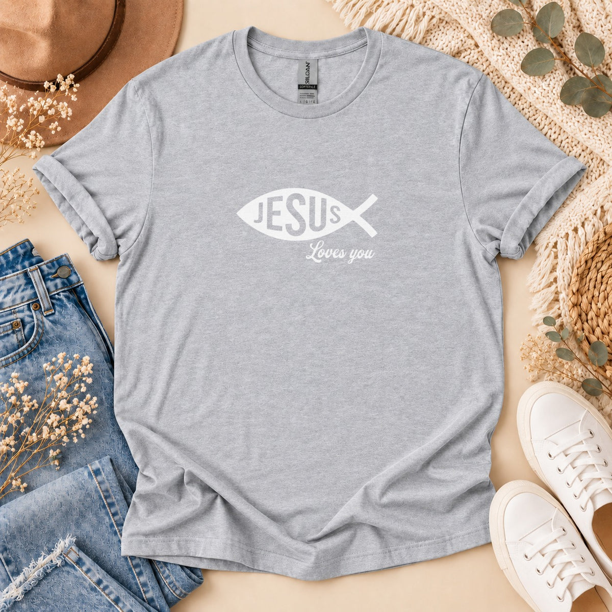 Grey t-shirt with white Ichthys fish symbol and "Jesus Loves you" text.