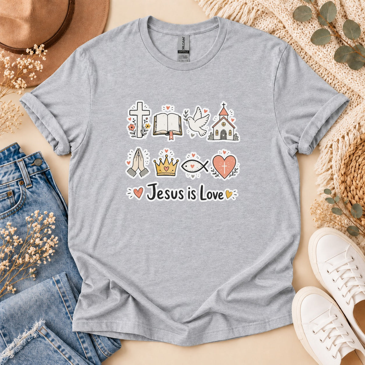 Gray t-shirt with religious icons and text "Jesus is Love" graphic.