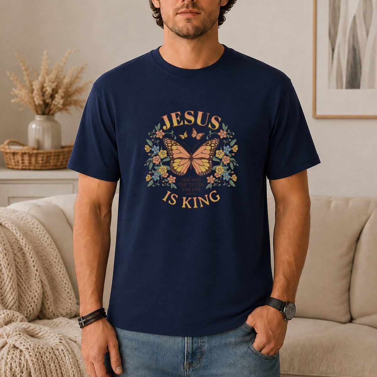 Navy t-shirt with Jesus text, butterfly, and floral graphic.