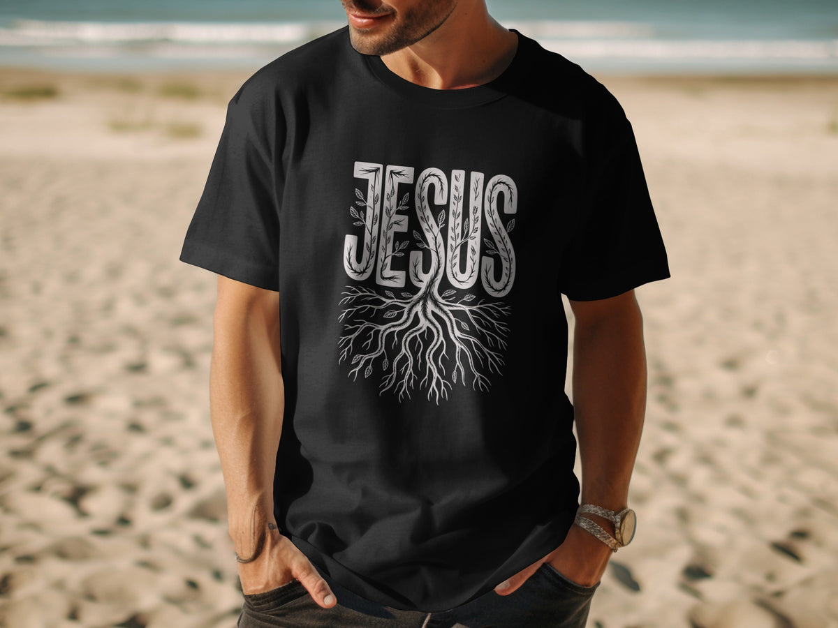 Black t-shirt with "JESUS" text and tree roots design.