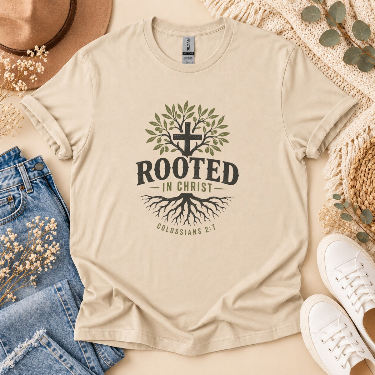 Tan t-shirt with "ROOTED IN CHRIST" and Colossians 2:7 graphic.