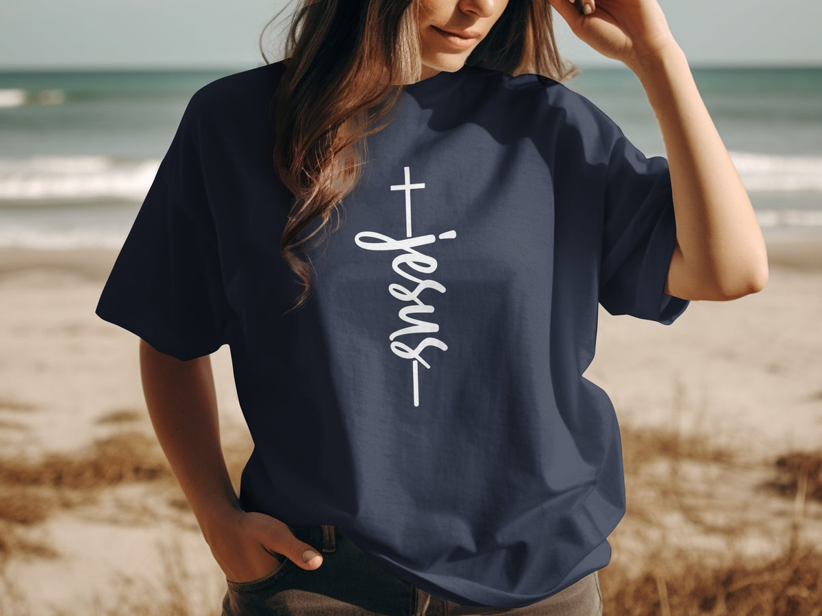 Navy t-shirt with white vertical cross and "Jesus" text on chest
