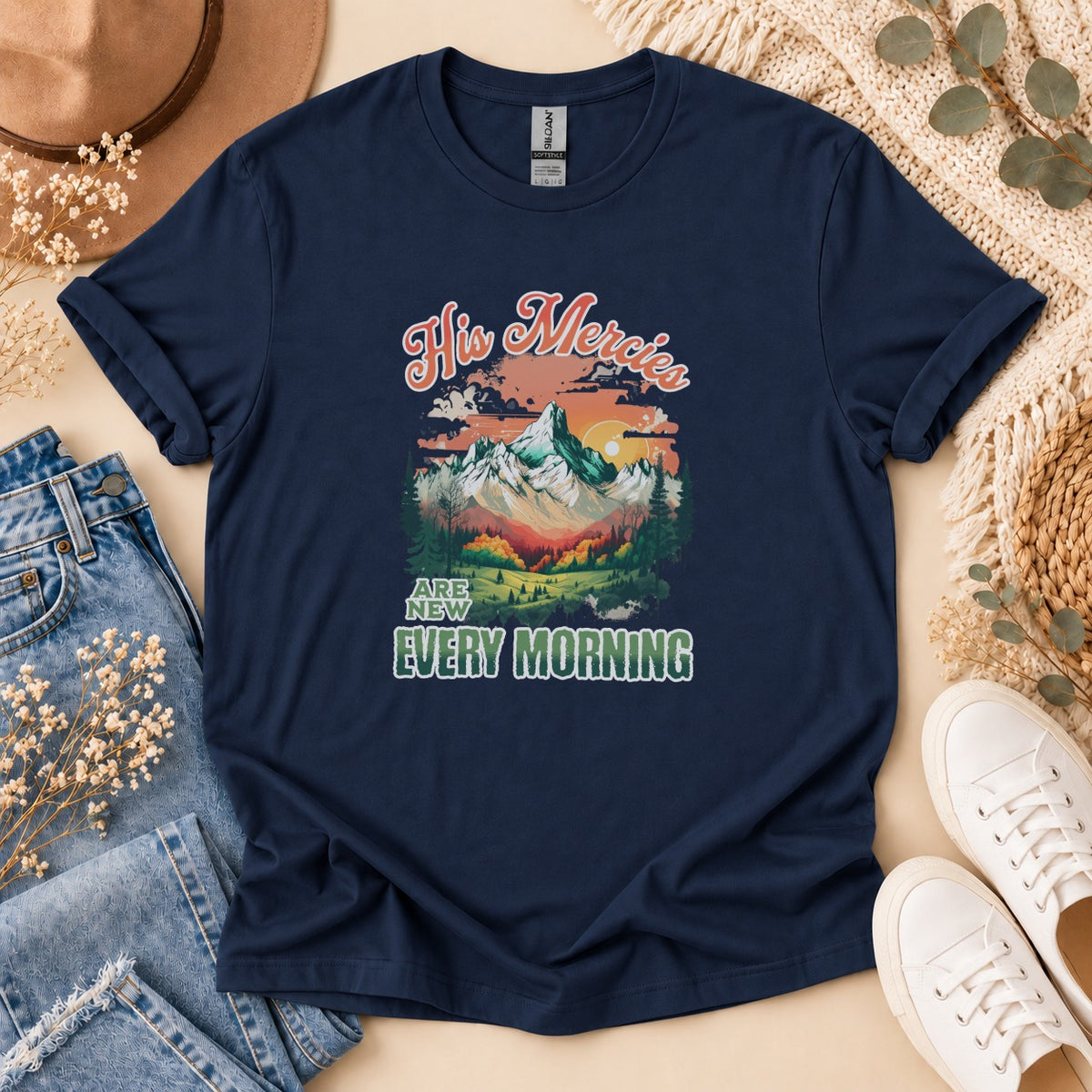 Navy t-shirt with "His Mercies Are New Every Morning" and mountain graphic.