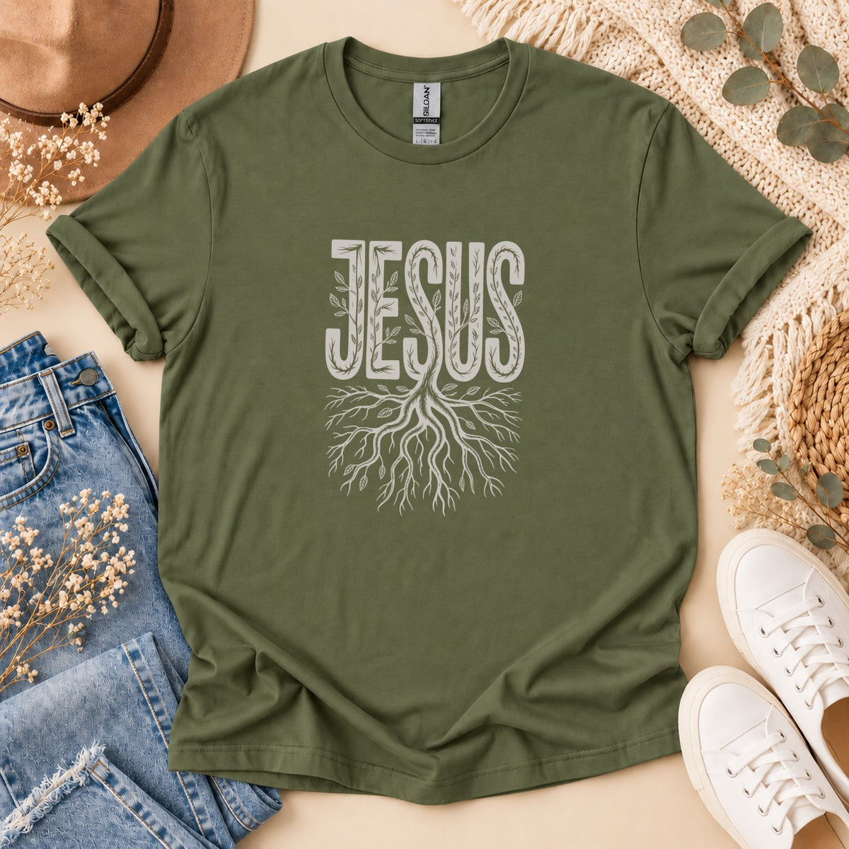 Olive green t-shirt with "JESUS" text and root graphic.