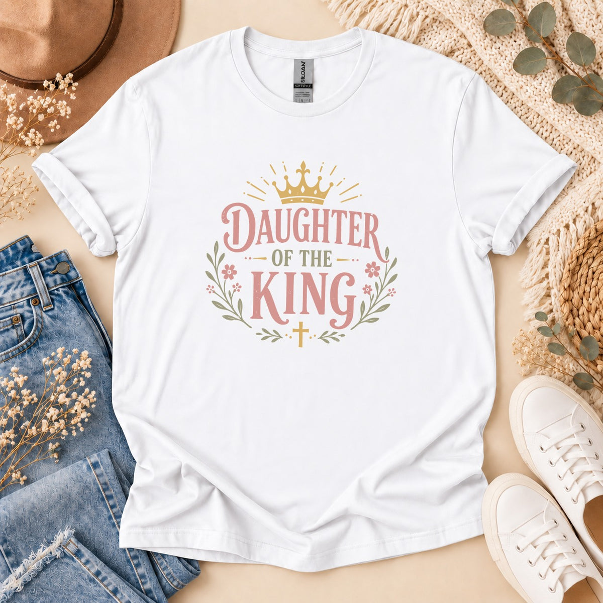 White t-shirt with "Daughter of the King" text and crown design.