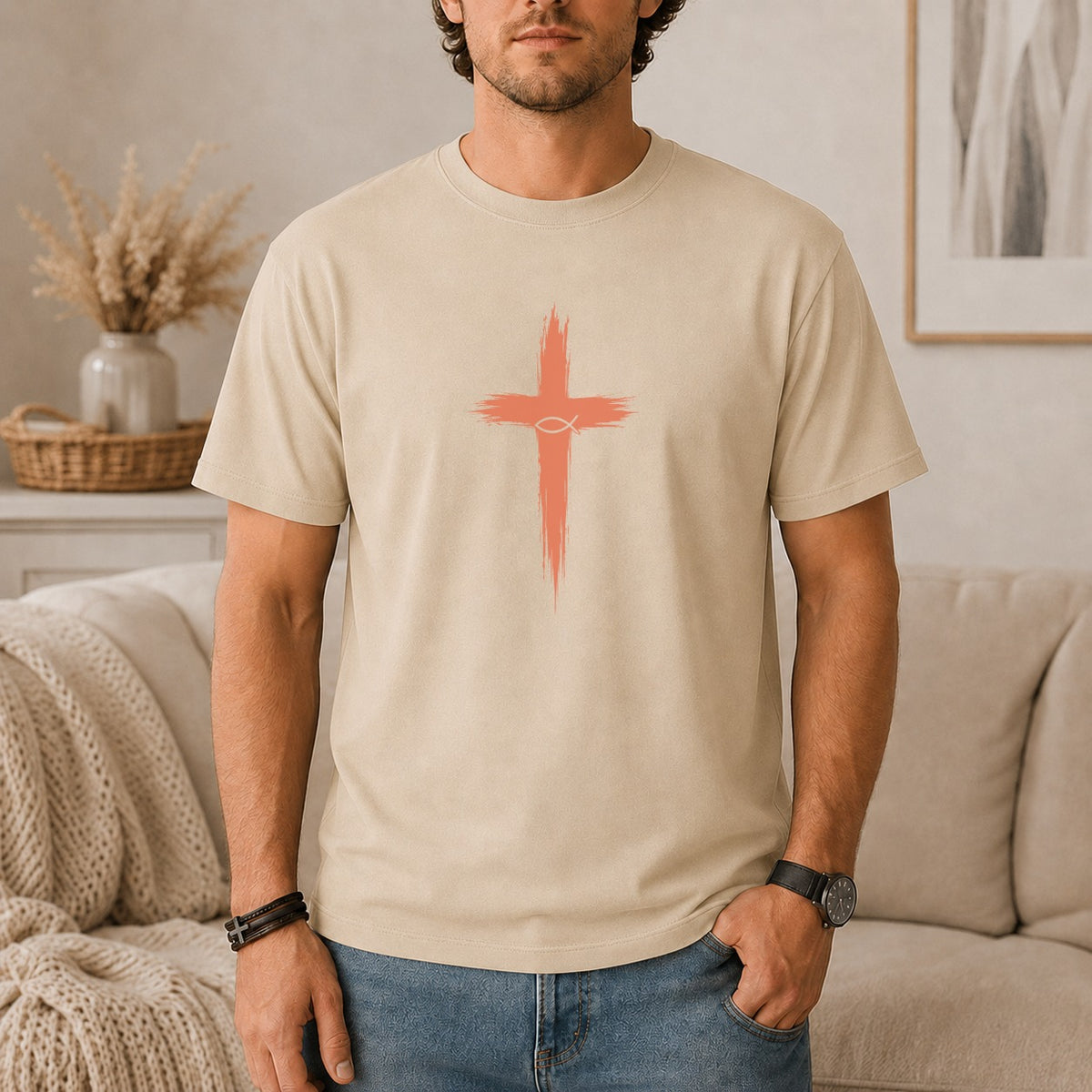 Light tan t-shirt with a distressed coral cross and fish symbol graphic.