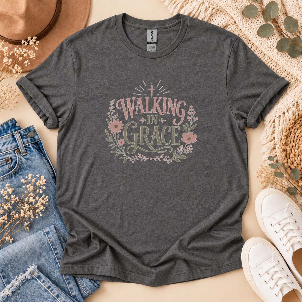Dark grey t-shirt with "Walking In Grace" floral graphic and Gildan tag.