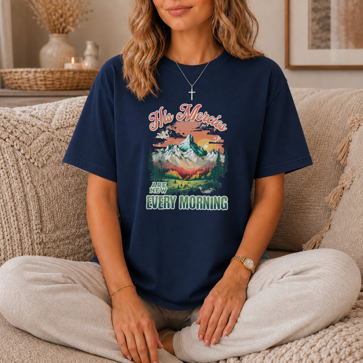 Navy t-shirt with "His Mercies ARE NEW EVERY MORNING" mountain graphic.