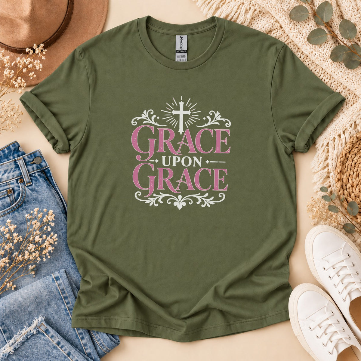 Olive green t-shirt with pink text "Grace Upon Grace" and a cross.