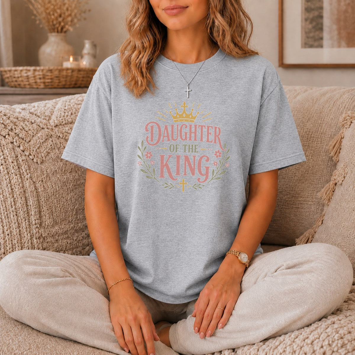 Grey t-shirt with "Daughter of the King" text and floral design.