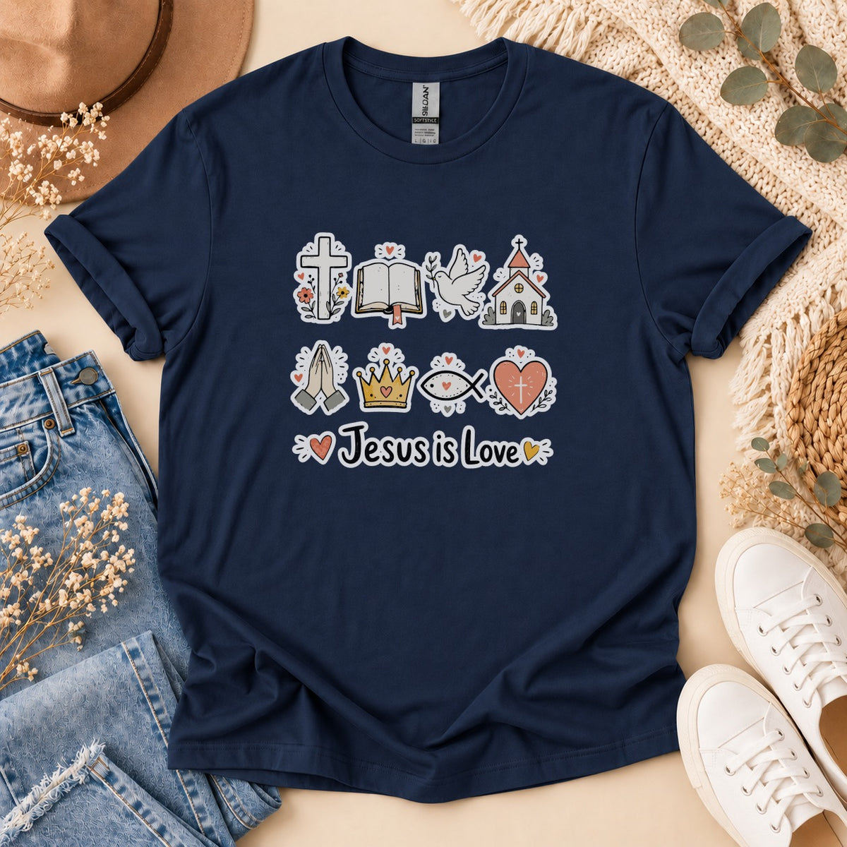 Navy t-shirt with religious icons and "Jesus is Love" text graphic.