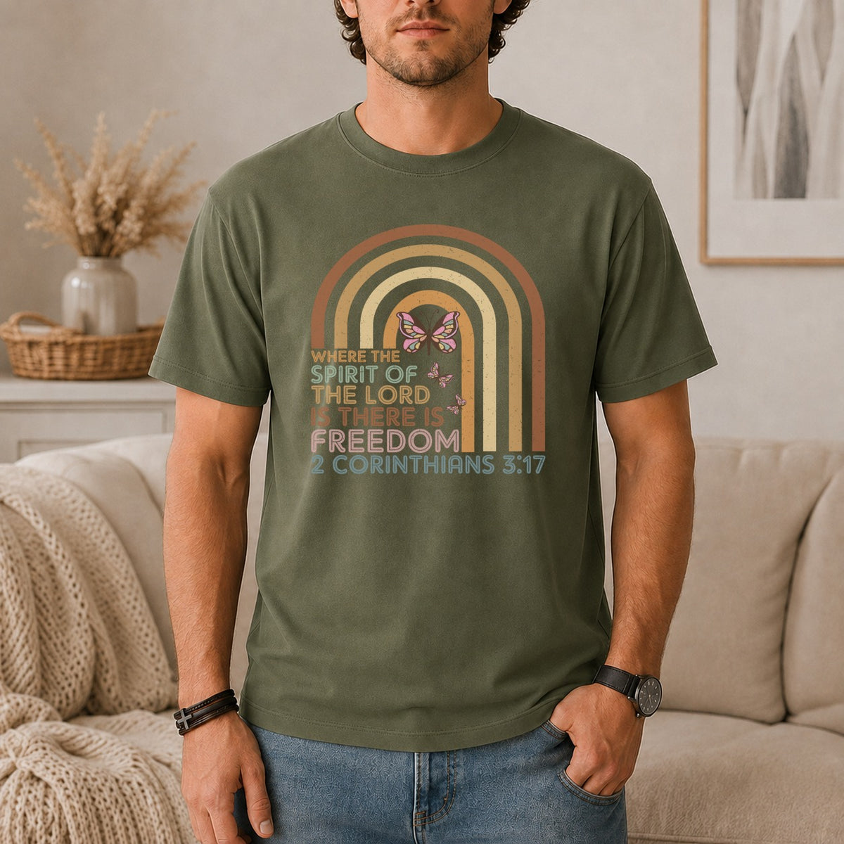 Green t-shirt with rainbow graphic and butterflies, text "Where the spirit of the Lord is there is freedom 2 Corinthians 3:17".