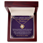 Gold Sweet 16 love knot necklace in mahogany luxury gift box