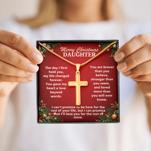 Christmas gift for daughter: woman holding a personalized cross necklace with Merry Christmas Daughter card