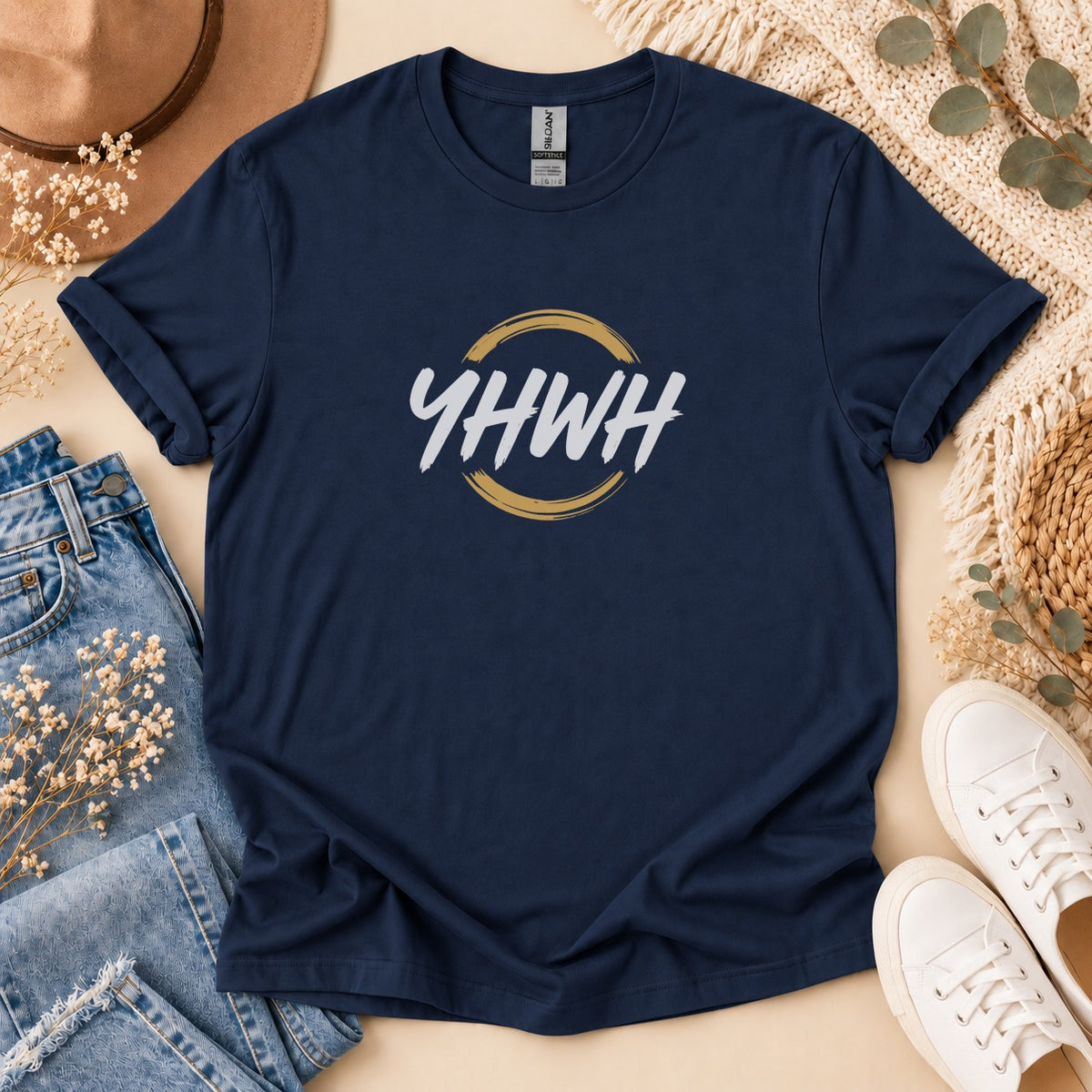 Navy t-shirt with white "YHWH" text inside a gold circle with brush strokes.