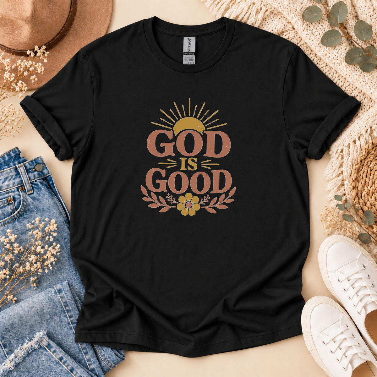 Black t-shirt with "GOD IS GOOD" text and sun graphic.