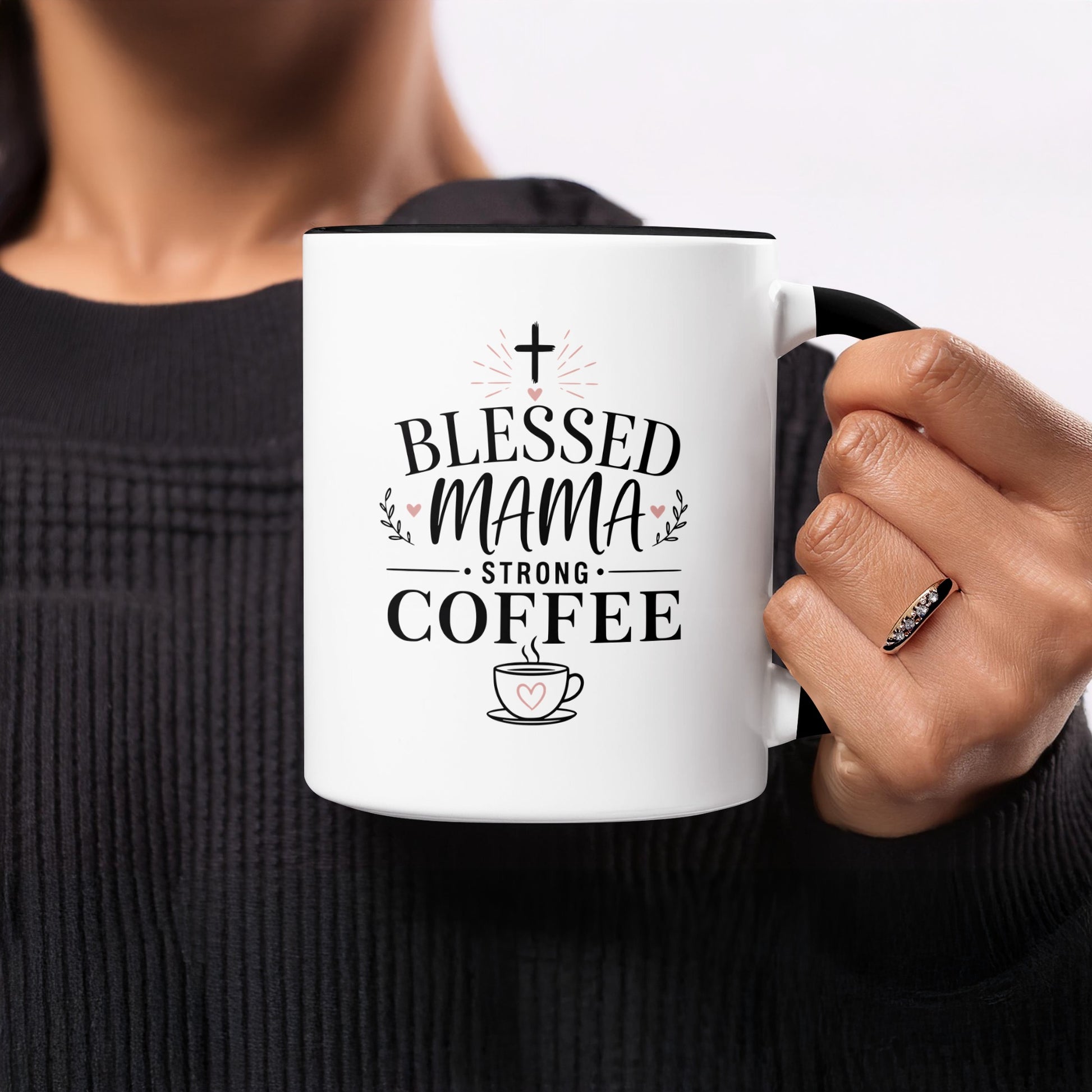 White mug with black rim, "Blessed Mama Strong Coffee" text, and heart-shaped coffee cup.