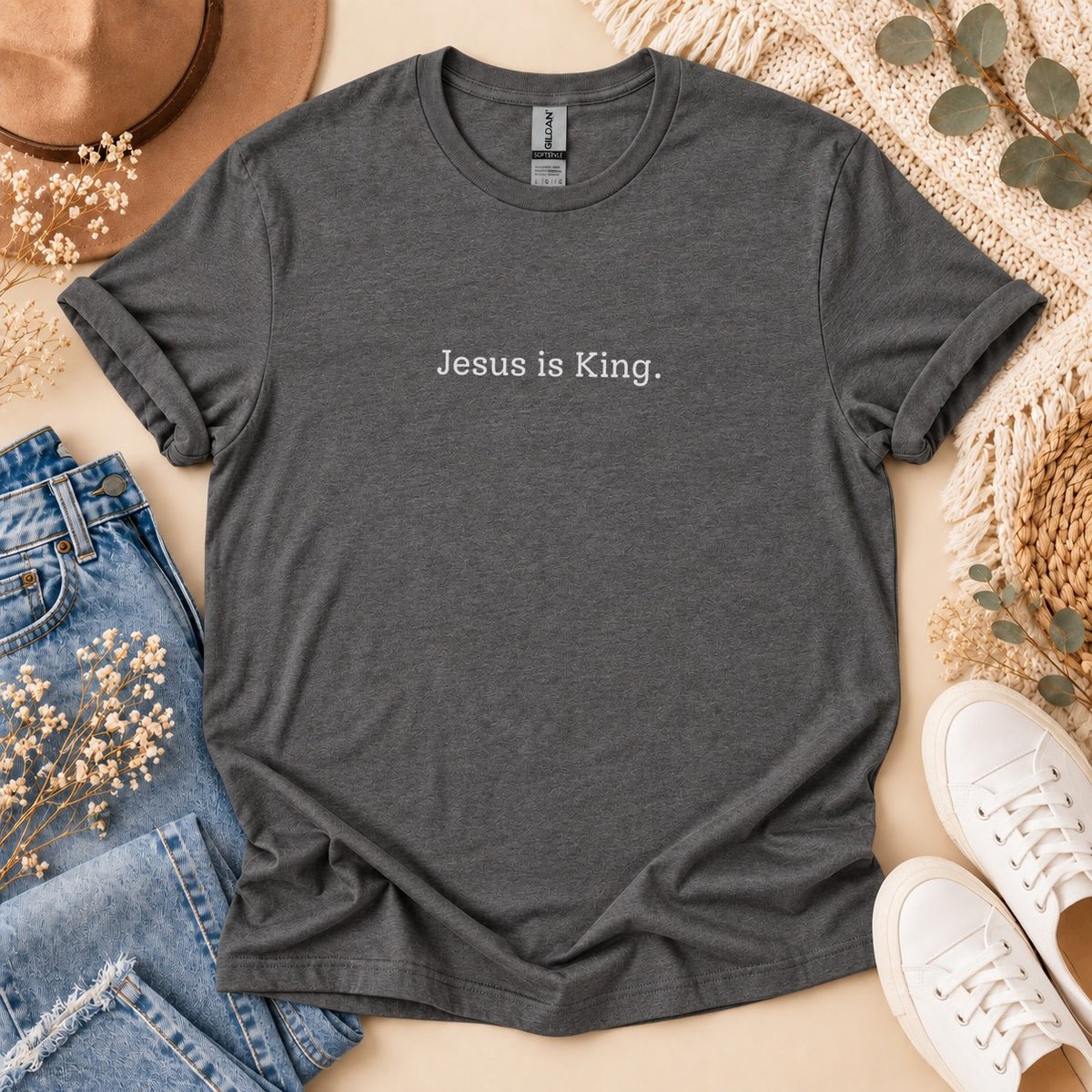 Dark grey t-shirt with "Jesus is King." text.