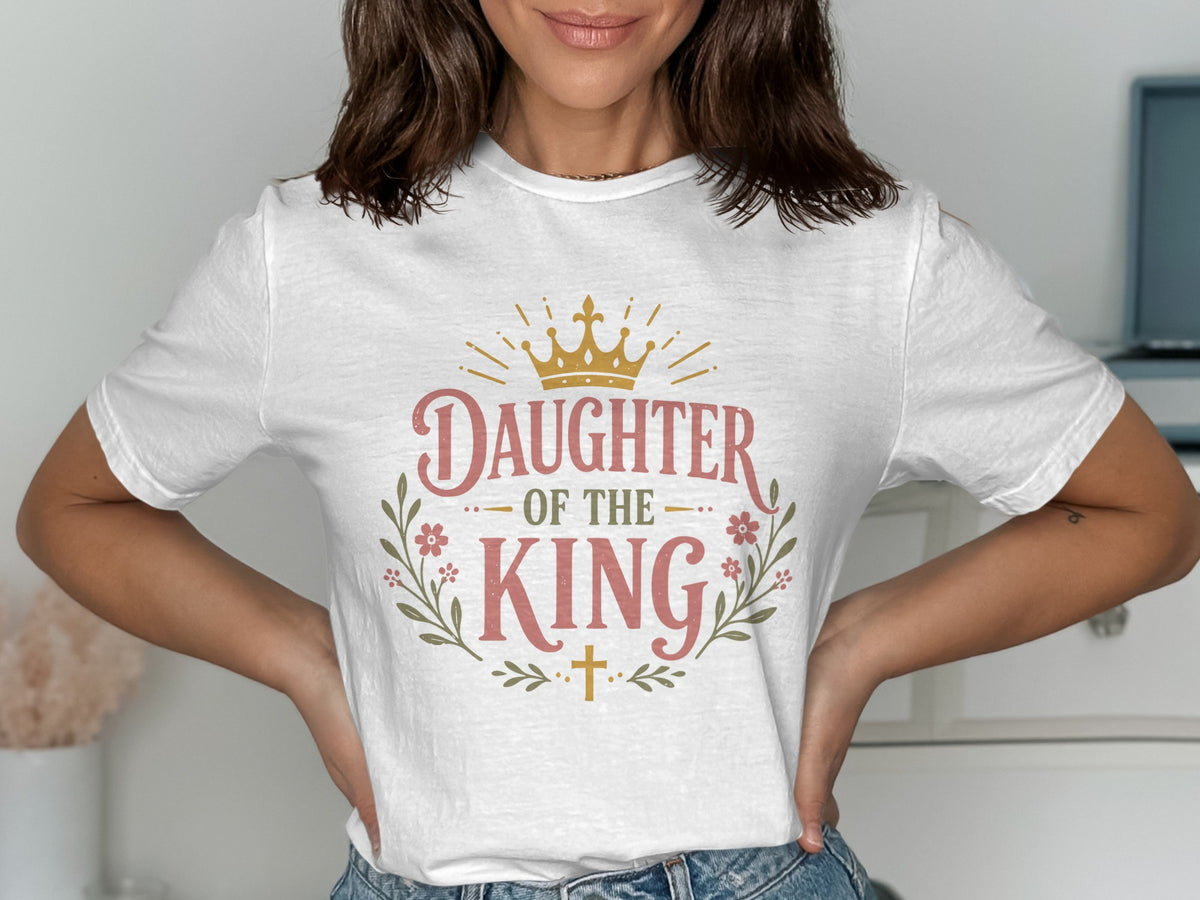 White t-shirt with "Daughter of the King" text, crown, and floral design.