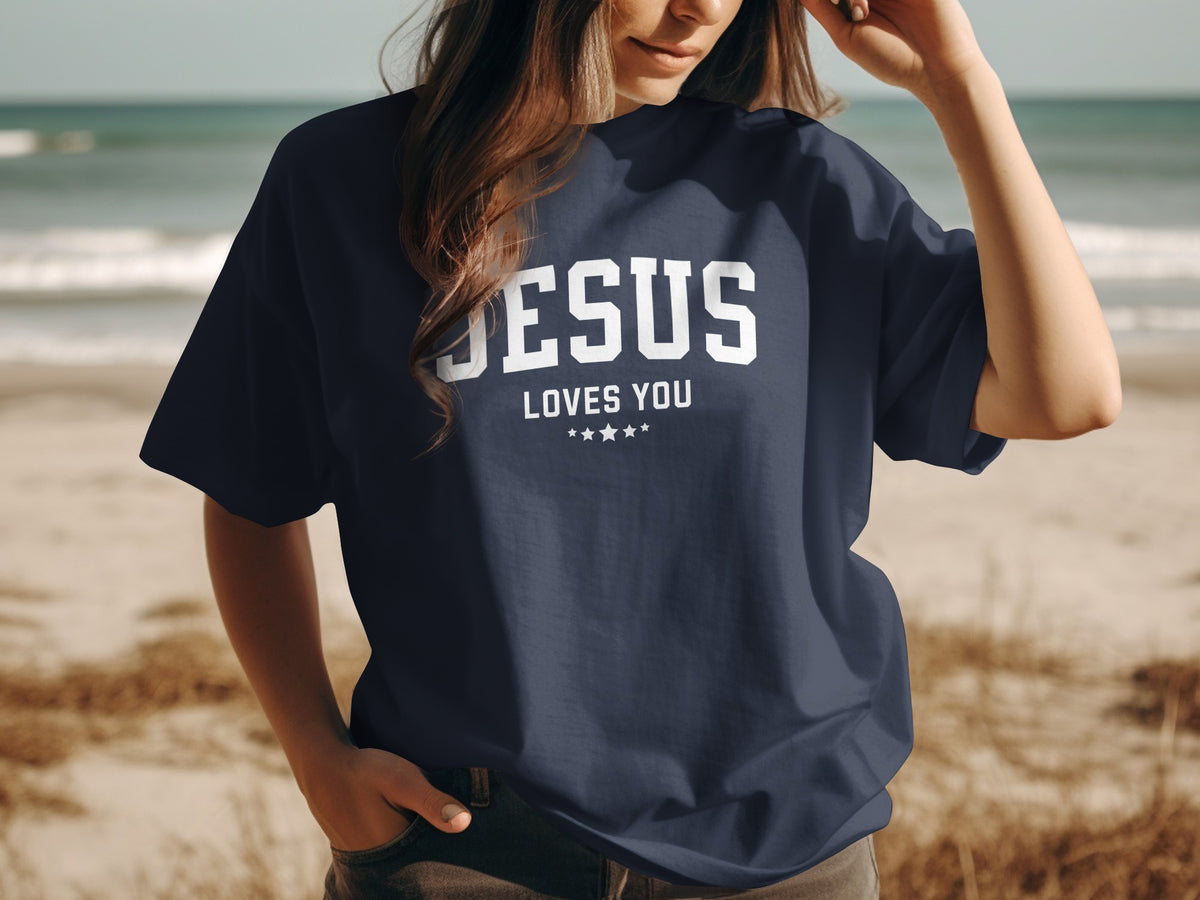 Dark blue t-shirt with "JESUS LOVES YOU" text and stars.