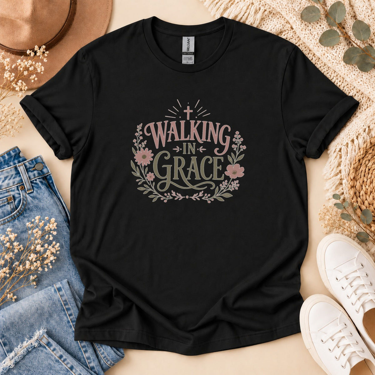 Black t-shirt with "Walking in Grace" floral graphic and cross.