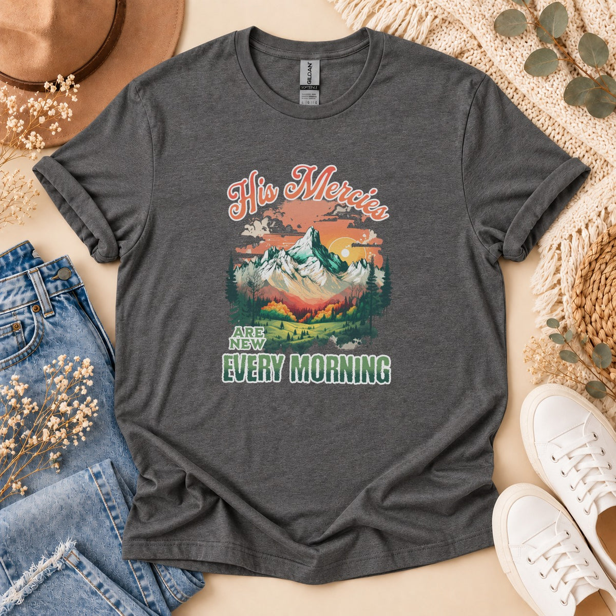 Dark grey t-shirt with "His Mercies Are New Every Morning" text and mountain graphic.