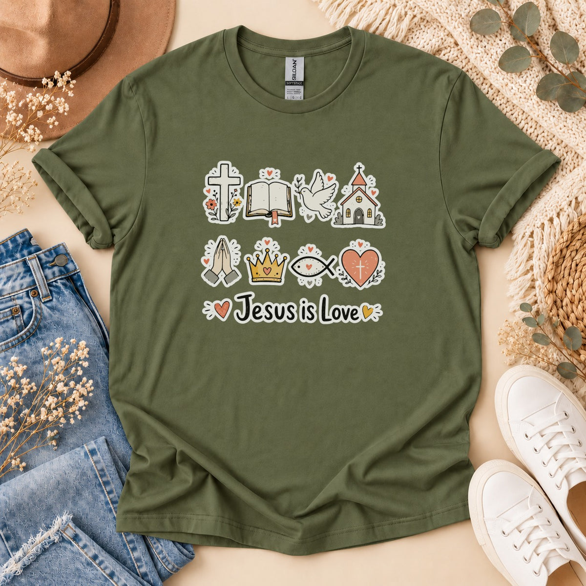 Olive green t-shirt with Christian symbols and "Jesus is Love" text.