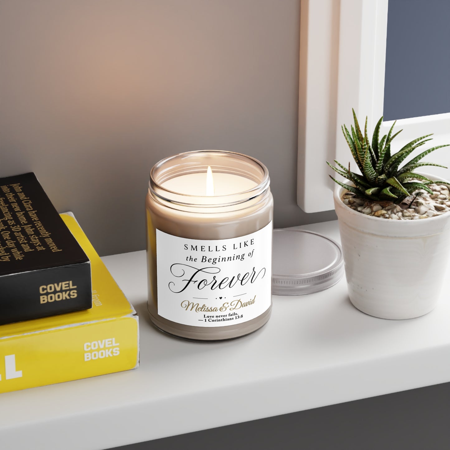 Candle labeled "Smells like the Beginning of Forever" with names and Bible verse.