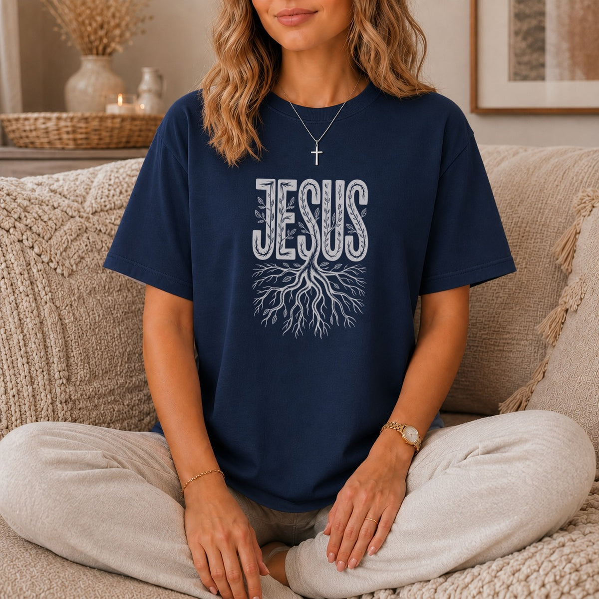 Navy t-shirt with "JESUS" and tree roots design.