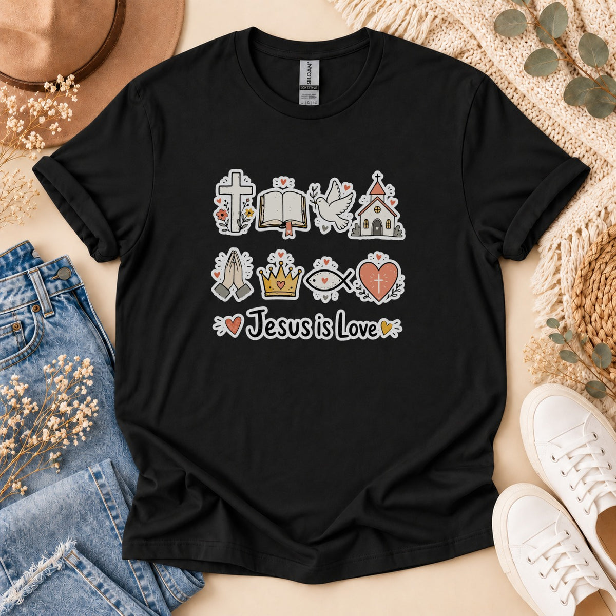 Black t-shirt with religious icons and "Jesus is Love" text graphic.