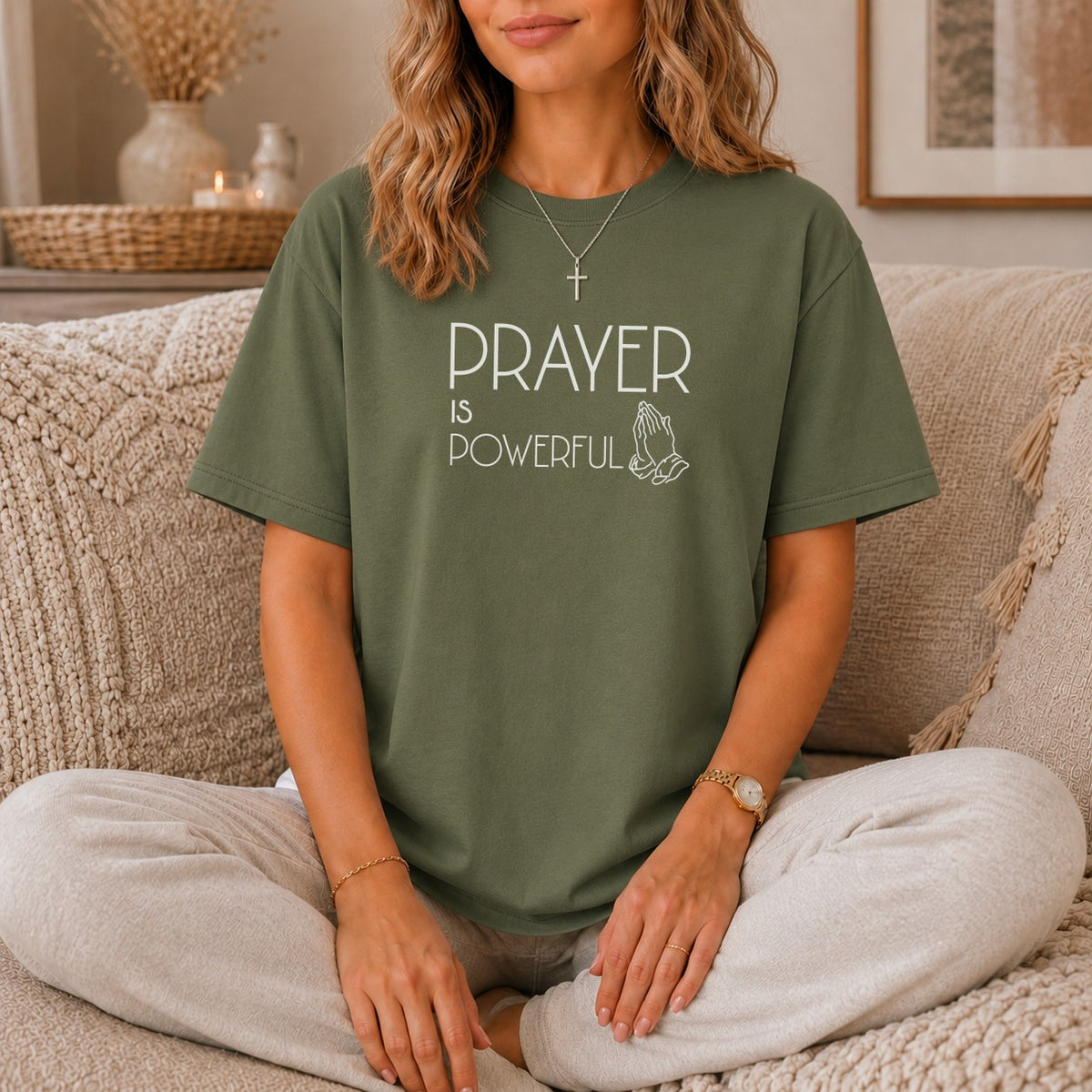 Green t-shirt with "Prayer is Powerful" text and praying hands graphic.