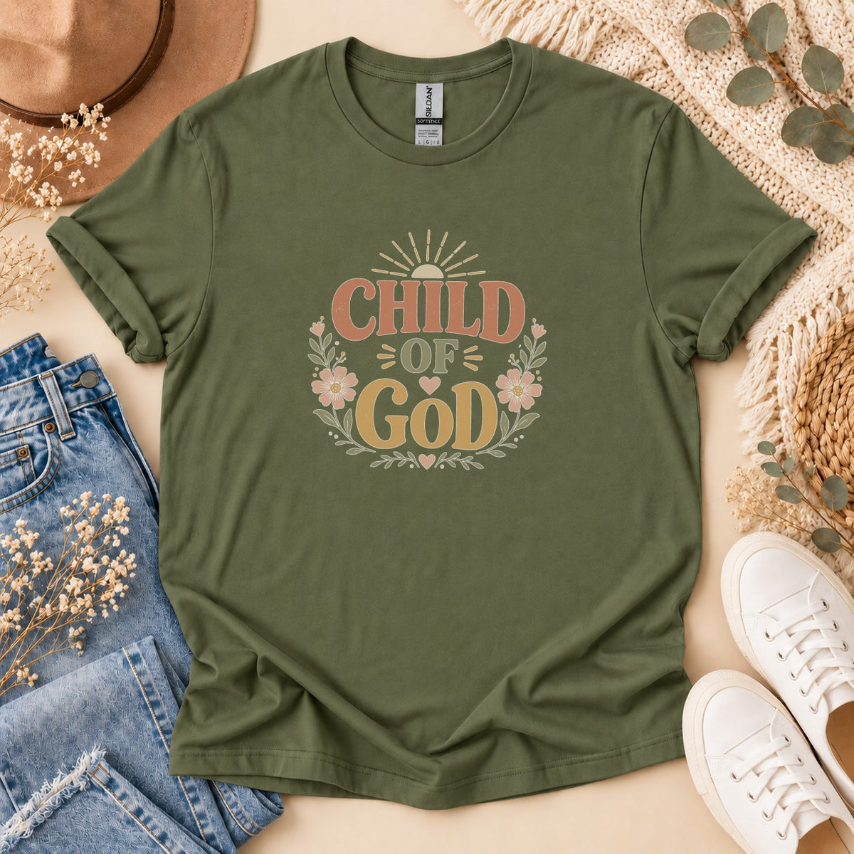 Olive green t-shirt with "Child of God" text and floral design.