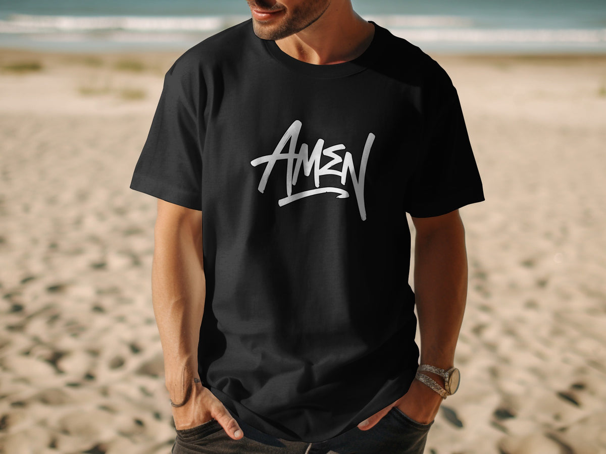 Black t-shirt with white "AMEN" graphic on a beach background.