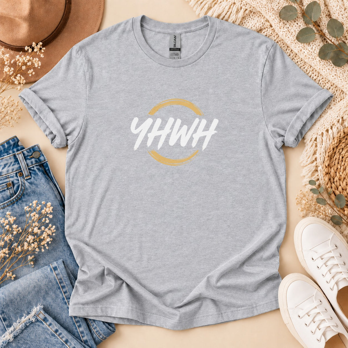 Grey t-shirt with "YHWH" text in a yellow circle and white brushstrokes.