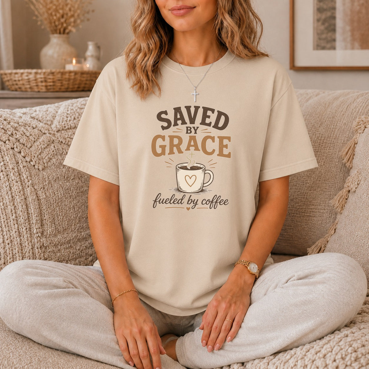 T-shirt with "Saved by Grace fueled by coffee" text and coffee cup graphic.